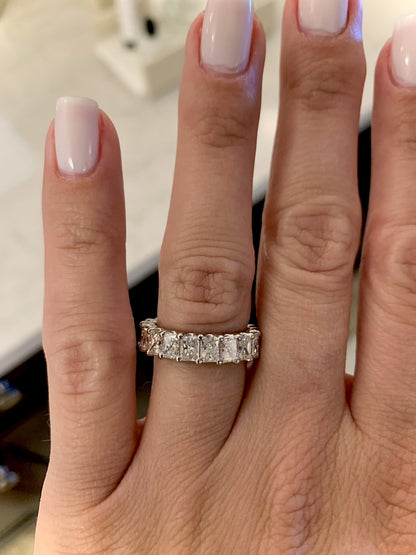 Hand model showcasing Radiant Cut Eternity Rings - Diamond in Platinum