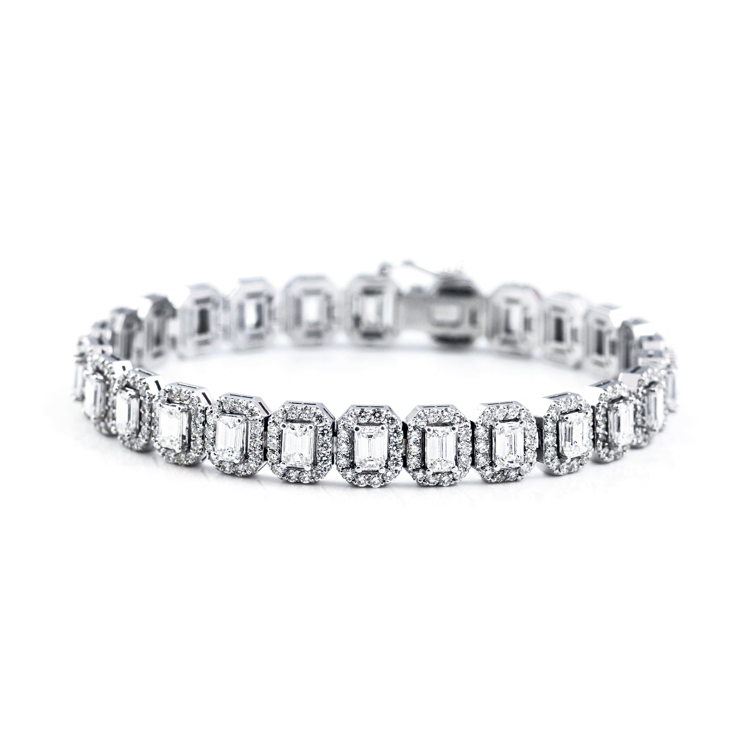 Close up of Emerald Cut Diamond Halo Bracelet - 8ct in 14K White Gold by TJA